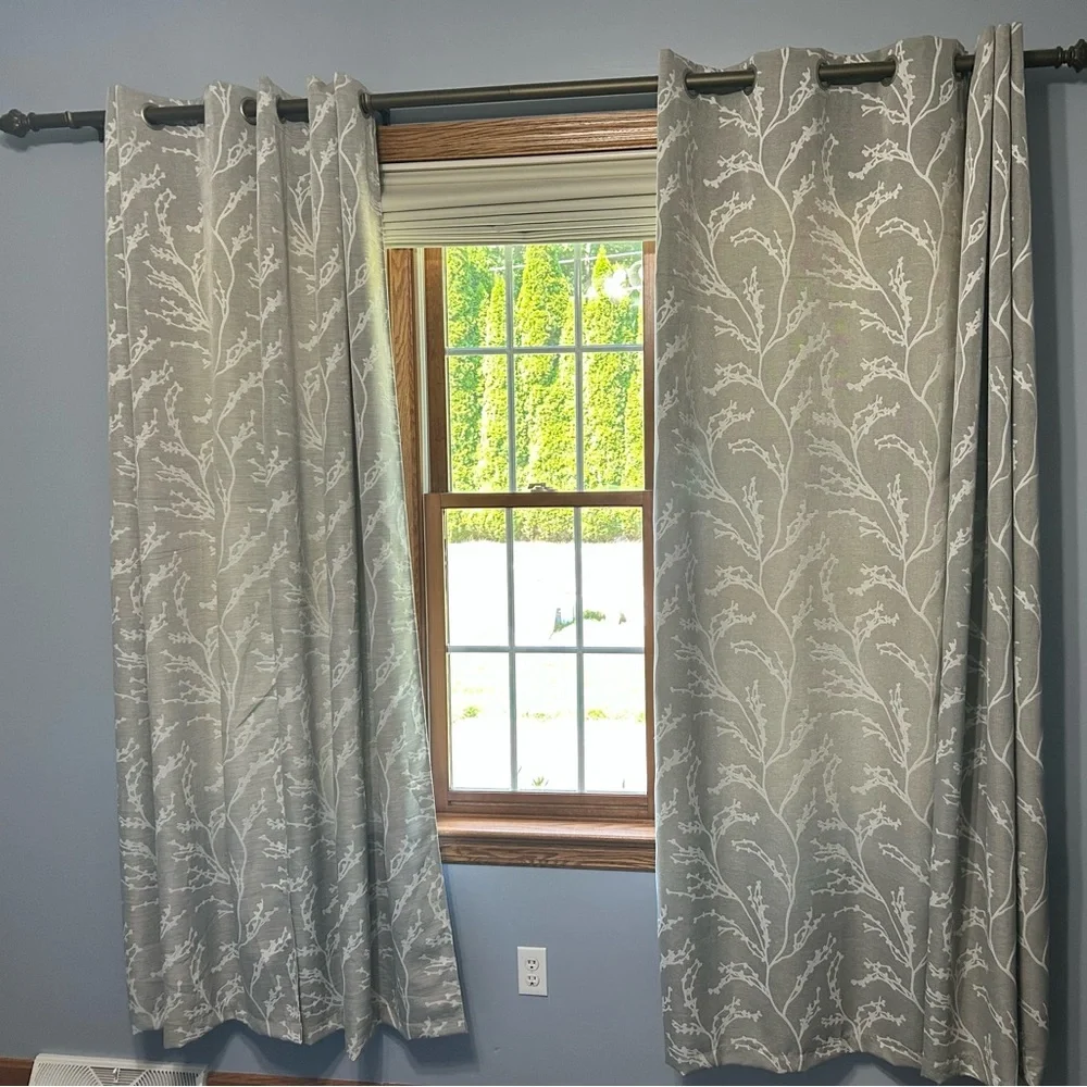 Large grey and white curtains.